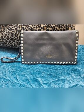 Valentino Garavani Rockstud clutch bag. 